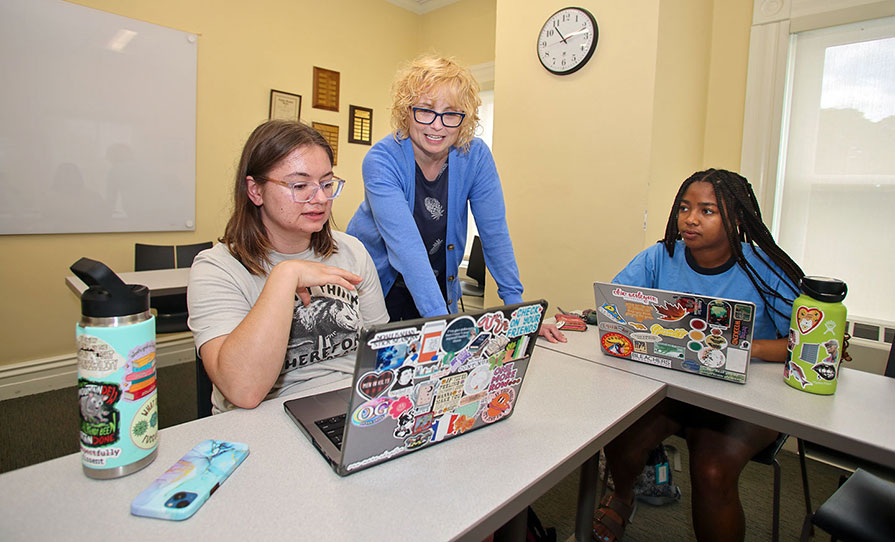 Alana Wilson ’26 (from left), Franchesca Nestor, and Camille Payne ’26