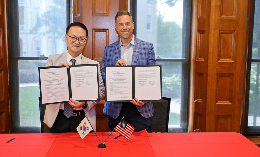 Kyoung-dong Yoo (left) and President Matt vandenBerg