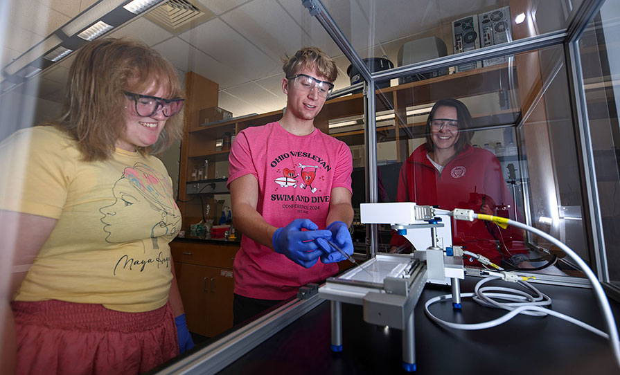 Haleigh Stover ’25 (from left), Evan Lucas ’26, and Professor Bethany Rudd