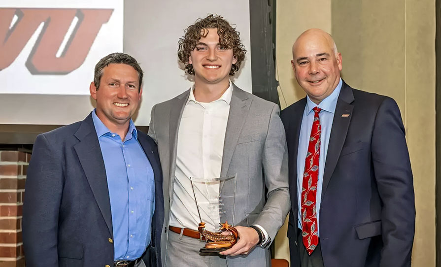 Trey Theobald '25 (center) and Kris Boey (left) and Doug Zipp